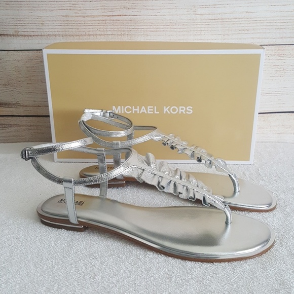 Michael Kors Shoes - New Michael Kors Silver Bella Thong Sandal